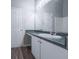 Bathroom with a large mirror and vanity with ample counter space at 5779 Wellborn Creek Dr, Lithonia, GA 30058