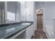Bathroom with a large mirror and vanity with ample counter space at 5779 Wellborn Creek Dr, Lithonia, GA 30058