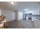 Eat-in kitchen featuring stainless steel appliances, modern white cabinets, and a gray backsplash at 5779 Wellborn Creek Dr, Lithonia, GA 30058