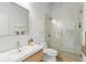 Modern bathroom with a sleek vanity, toilet, and glass-enclosed tiled shower at 820 Dekalb Ne Ave # 2, Atlanta, GA 30307