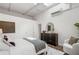 Cozy bedroom featuring a skylight, modern dresser, and comfortable seating area at 820 Dekalb Ne Ave # 2, Atlanta, GA 30307