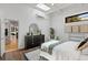 Well-lit bedroom features modern decor, skylight, dresser and stylish accents at 820 Dekalb Ne Ave # 2, Atlanta, GA 30307