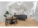 Charming dining area next to the kitchen featuring modern table setting, wood floors, and bright lighting at 820 Dekalb Ne Ave # 2, Atlanta, GA 30307