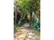 Exterior walkway features professional landscaping, stone features and mature trees at 820 Dekalb Ne Ave # 2, Atlanta, GA 30307