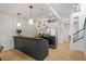 Kitchen area featuring stainless steel appliances, granite countertops, and modern open shelving at 820 Dekalb Ne Ave # 2, Atlanta, GA 30307