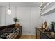 Kitchen area featuring granite countertops, stainless steel appliances, and industrial-style lighting at 820 Dekalb Ne Ave # 2, Atlanta, GA 30307