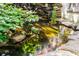 Exterior view of a decorative Koi pond with a small waterfall at 820 Dekalb Ne Ave # 2, Atlanta, GA 30307