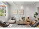 Elegant living room with large window, stylish furnishings, and neutral tones, creating a serene and inviting atmosphere at 820 Dekalb Ne Ave # 2, Atlanta, GA 30307