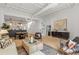 Open-concept living space connected to kitchen and dining, offering modern fixtures, hardwood floors, and industrial touches at 820 Dekalb Ne Ave # 2, Atlanta, GA 30307