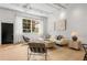 Bright living room featuring a large window, neutral color palette, and contemporary furnishings for a comfortable ambiance at 820 Dekalb Ne Ave # 2, Atlanta, GA 30307
