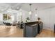 Bright modern living area with industrial ductwork, open kitchen, and large window at 820 Dekalb Ne Ave # 2, Atlanta, GA 30307