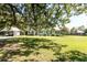 Charming single-story home with well-maintained lawn and ample shade from mature trees at , Social Circle, GA 30025