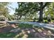 Quaint single-story home with a charming front yard and a long gravel driveway at , Social Circle, GA 30025