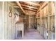 Quaint interior space with rustic wood walls, shelving, and vintage decor at , Social Circle, GA 30025