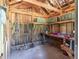 Interior workspace with rustic wooden walls, shelving, and assorted tools at , Social Circle, GA 30025