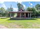 Outbuilding with covered porch and rocking chairs at , Social Circle, GA 30025