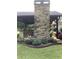 Outdoor stone fireplace with covered patio area, complete with bar and seating at , Social Circle, GA 30025
