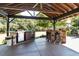 Outdoor kitchen with stainless steel grill and bar at , Social Circle, GA 30025