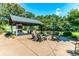 Outdoor patio with fireplace and seating in covered structure at , Social Circle, GA 30025
