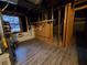 Unfinished basement with wood-look vinyl flooring and a window at 1194 Clichy Ct, Marietta, GA 30066