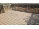 Exterior shot of a wooden deck with a stained railing at 1194 Clichy Ct, Marietta, GA 30066