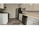 Cozy kitchen featuring stainless steel appliances and plenty of counter space at 1194 Clichy Ct, Marietta, GA 30066