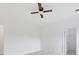 Spacious bedroom with carpet and a ceiling fan, featuring neutral tones and natural light at 232 Hunt Ne St, Marietta, GA 30060