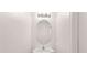 Charming powder room with a unique pedestal sink and decorative oval mirror at 2736 Parkway Trl, Lithonia, GA 30058