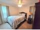 Cozy bedroom featuring plush carpeting, ample natural light, and classic furnishings at 3226 Hope St, Hapeville, GA 30354