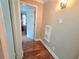 Hallway with hardwood flooring leading to an inviting bedroom or living space at 3226 Hope St, Hapeville, GA 30354