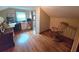 Attic home office with hardwood floors, work space, and natural light at 3226 Hope St, Hapeville, GA 30354