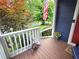 Charming porch with white railings and a view of the neighborhood at 3226 Hope St, Hapeville, GA 30354