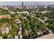 Expansive aerial view showcasing the neighborhood and the nearby Atlanta skyline in the background at 588 Angier Ne Ave, Atlanta, GA 30308