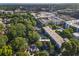 Aerial view of property at 588 Angier Ave, surrounded by trees, homes, and city buildings at 588 Angier Ne Ave, Atlanta, GA 30308