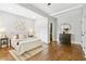 Comfortable bedroom featuring hardwood floors, a ceiling fan, and tasteful furnishings at 588 Angier Ne Ave, Atlanta, GA 30308