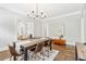 Elegant dining room with hardwood floors, stylish decor, and open layout at 588 Angier Ne Ave, Atlanta, GA 30308