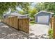 View of the house, garage and fenced yard at 588 Angier Ne Ave, Atlanta, GA 30308