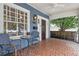 Inviting front porch with cozy seating, a decorative tile floor, and a charming craftsman-style front door at 588 Angier Ne Ave, Atlanta, GA 30308
