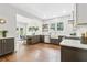 Bright kitchen featuring stainless steel appliances, custom cabinets, and a dining area with outdoor access at 588 Angier Ne Ave, Atlanta, GA 30308