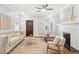 Bright and airy living room with a fireplace, hardwood floors, and neutral decor at 588 Angier Ne Ave, Atlanta, GA 30308