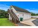 Detached two-car garage with exterior staircase to a second story at 2595 Ross Rd, Snellville, GA 30039