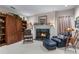 Cozy living room featuring a fireplace with marble surround and inviting furniture at 2595 Ross Rd, Snellville, GA 30039