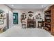 Eclectic living room showcases a curated collection of artwork and shelving with unique decor at 2595 Ross Rd, Snellville, GA 30039