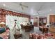 Bright sunroom with tile floor, ceiling fans, and comfortable seating at 2595 Ross Rd, Snellville, GA 30039
