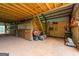 Barn interior featuring stalls, wooden structure, and natural light at 228 Indian Creek Rd, Locust Grove, GA 30248