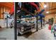 Car garage with multiple cars on hydraulic car lifts at 228 Indian Creek Rd, Locust Grove, GA 30248