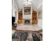 A fireplace in the living room with wooden cabinets on both sides of it at 228 Indian Creek Rd, Locust Grove, GA 30248