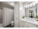 Bright bathroom with marble vanity, sink, and updated fixtures at 3063 Chastain Park Ne Ct, Atlanta, GA 30342