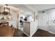 Open-concept kitchen with stainless steel appliances, granite countertops, and stylish finishes at 3063 Chastain Park Ne Ct, Atlanta, GA 30342