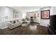 Stylish living area featuring a comfortable sofa, hardwood flooring, and modern decor at 3063 Chastain Park Ne Ct, Atlanta, GA 30342